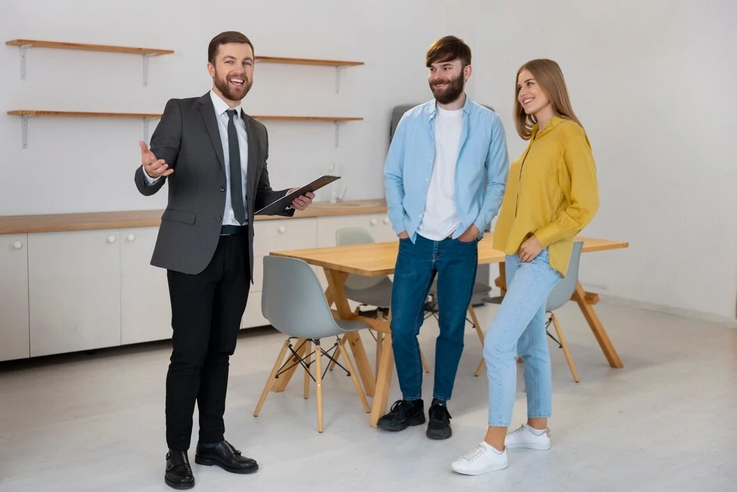 Property manager presenting to landlord couple